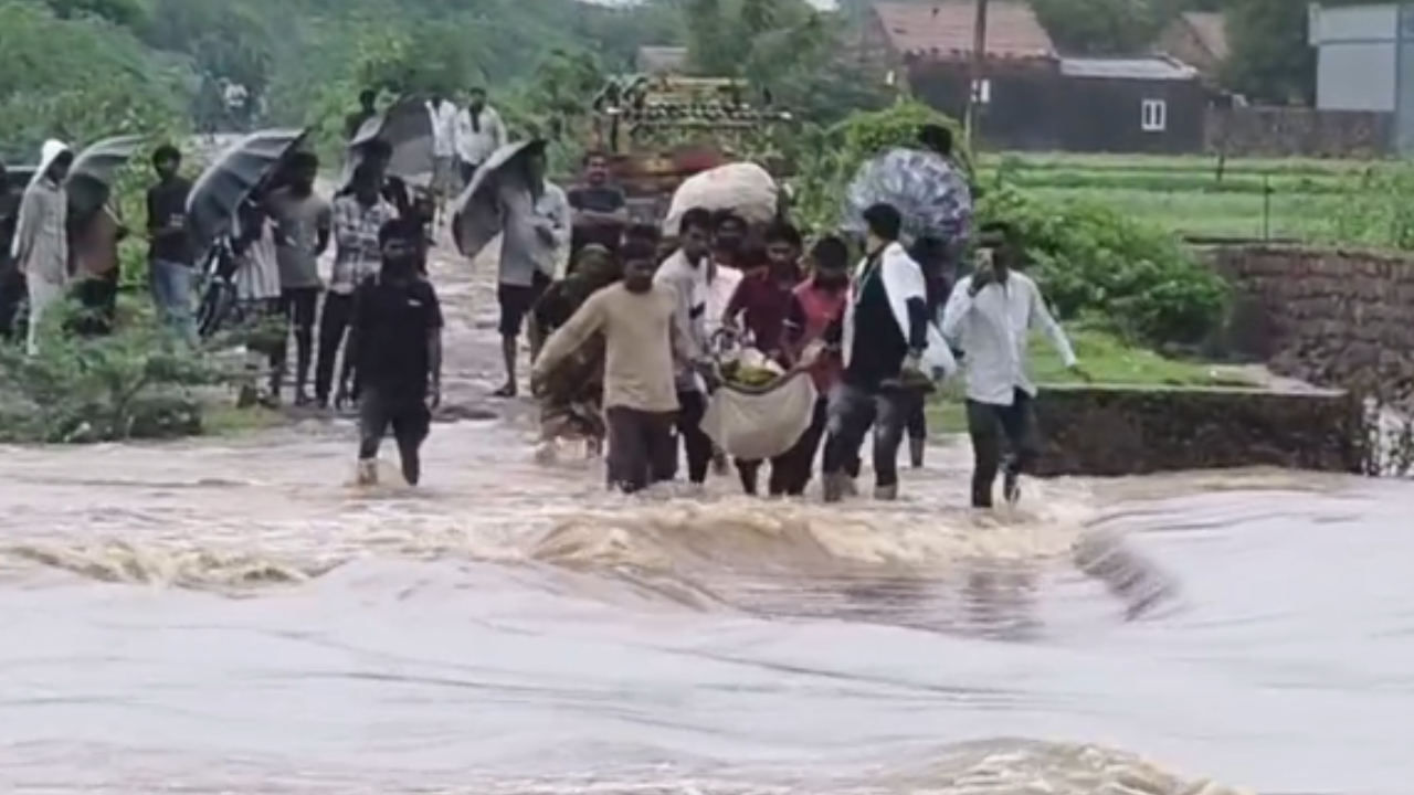 WATCH: Pregnant Woman Carried In Makeshift Sling As Floodwater Cuts Off Access To Gujarat Village