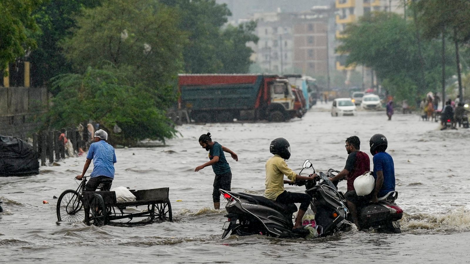 Surat on red alert, Delhi braces for heavy rain and sharp temperature drop