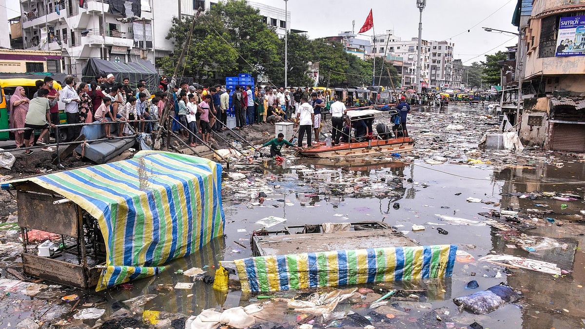 Gujarat announces rehabilitation package for businesses hit by Surat floods